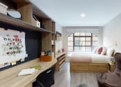 Thumbnail 8 of 8 - a bedroom with a bed and a desk in a small room