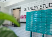 Thumbnail 8 of 8 - a view of the stanley studios restroom with the blue and white subway tiles