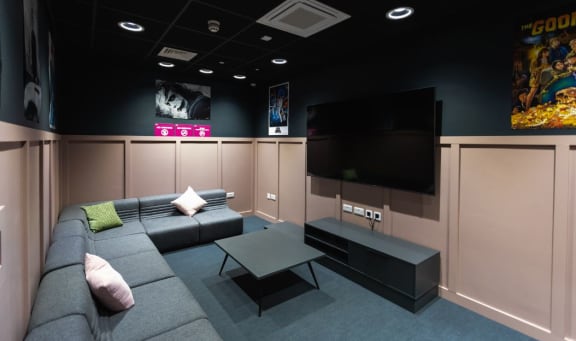 a living room with a couch and a television