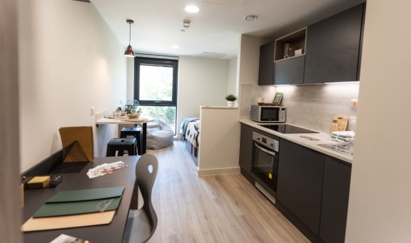 a kitchen and dining area in a small apartment
