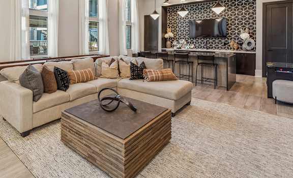 Community Clubhouse with Kitchenette Area and Game Tables at Alta 3Eighty Apartments located in Aubrey, TX-HOMEGALLERY.