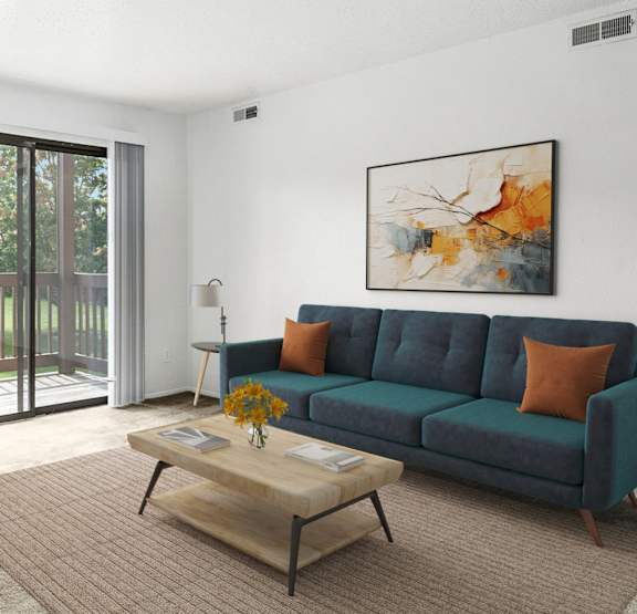 Living room with a slider to a balcony at Apple Ridge Apartments, Walker, 49534