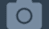 A simple icon of a camera.