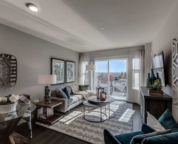 a living room with a couch and a table