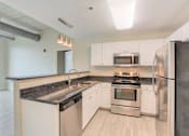 Thumbnail 1 of 16 - Renovated Kitchen at Studio One Apartments, Michigan