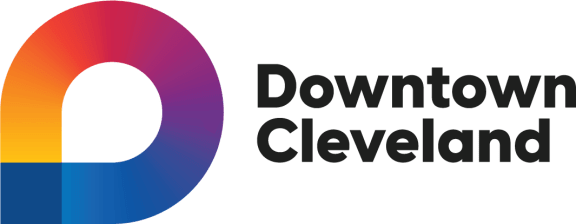 a logo with the words downtown cleveland on a black background