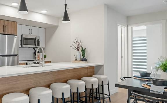 Living Area With TV at Vista Apartments at Edgemont, Alberta