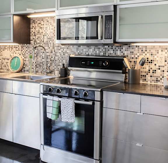 a kitchen with stainless steel appliances
