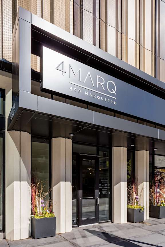 the facade of a building with a sign that reads 4 marc moderne