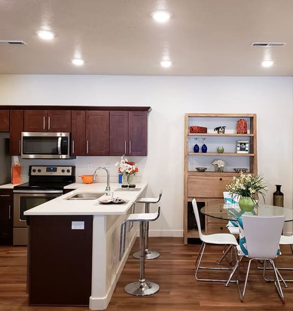 Open Kitchen and Dining Area at Four Seasons Apartments & Townhomes, Utah