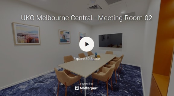a conference room with a table and chairs and the ukko meeting room 02