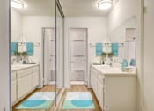 Thumbnail 8 of 16 - Mirrored wardrobe and bathroom at Village Pointe Apartment Homes at Village Pointe Apartments, Northridge, CA