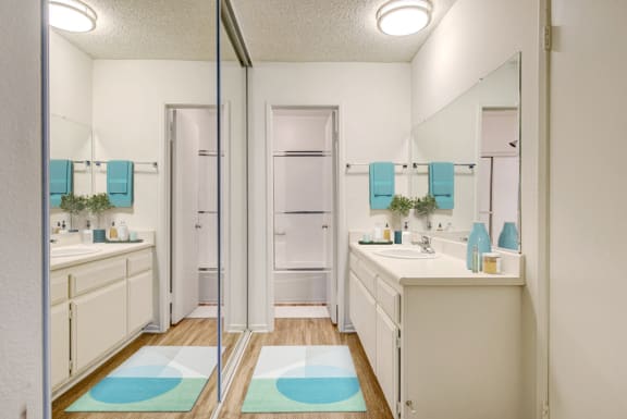 Mirrored wardrobe and bathroom at Village Pointe Apartment Homes at Village Pointe Apartments, Northridge, CA