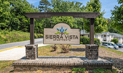 a sign that says sierra vista apartments