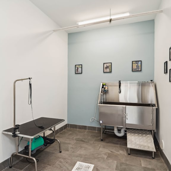 A room with a table and a sink. at The Point on 38th, Norfolk