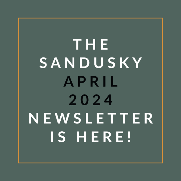 a picture of an orange background with the words the sandusky april 23 newsletter is here