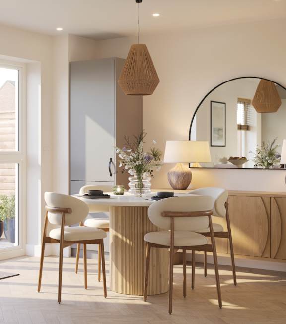 A modern kitchen with a dining table and chairs.