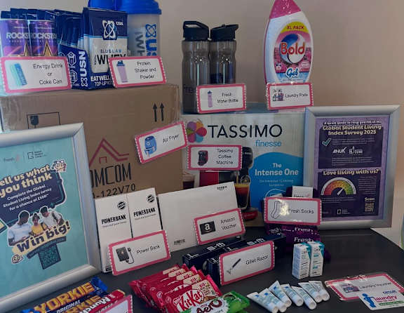 A table with a variety of products including Rockstar, Nestle, and Tassimo.