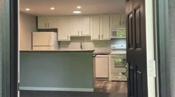 a view of the kitchen from the living room