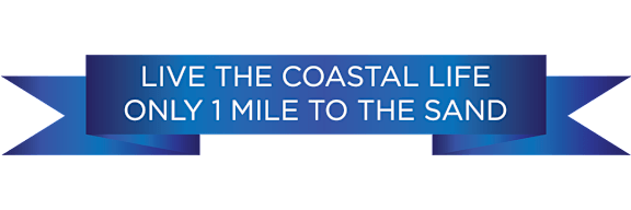 A blue banner with the text "LIVE THE COASTAL LIFE ONLY 1 MILE TO THE SAND".