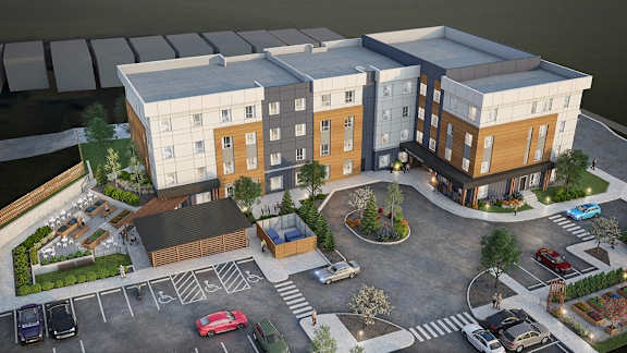 an aerial rendering of a three story building with a parking lot
