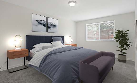 a bedroom with a bed and a chair