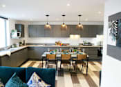 Thumbnail 8 of 8 - a kitchen and dining area in a 555 waverly unit