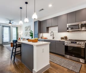 Tapestry at the Realm Apartments in Lewisville, Texas Model Kitchen with Island