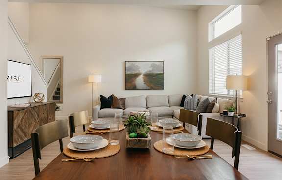 Cozy couch in a living room at Rise townhomes in South Jordan, Utah