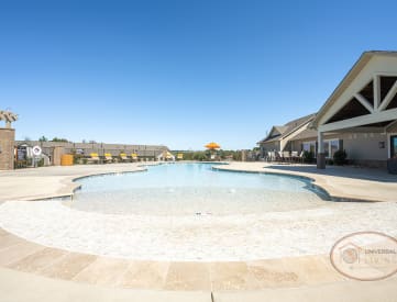 a resort style pool at the enclave at woodbridge apartments in sugar land, tx