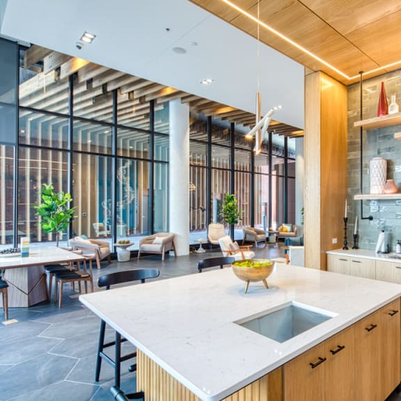 a rendering of a restaurant with tables and chairs in a lobby