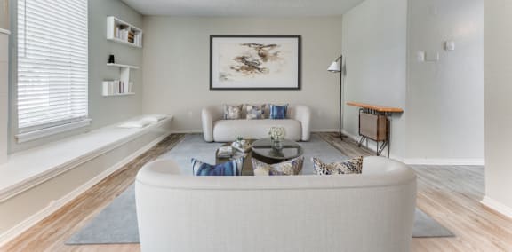 Living Room With Plenty Of Natural Light at Falls on Clearwood Apartments, Richardson, TX