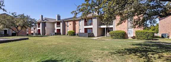 our apartments at the district feature a spacious yard and green grass