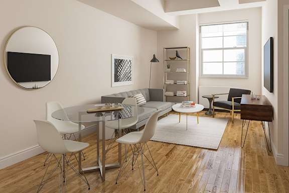 A modern dining room with a glass table and white chairs.at 21 West, New York, NY 10006