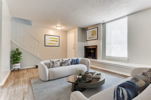 Living Room With Plenty Of Natural Light at Falls on Clearwood Apartments, Richardson, 75081