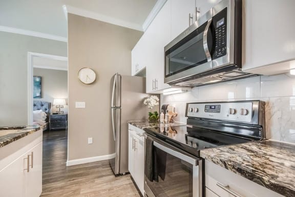 a kitchen with stainless steel appliances