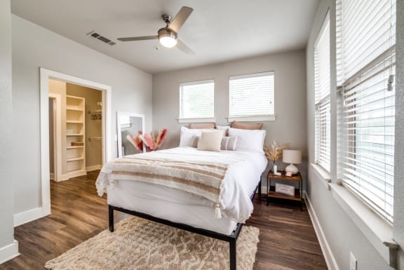 the residence with ceiling fan and closet at The Landings at Brooks City-Base, San Antonio, TX, 78235