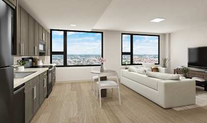 A modern kitchen with a view of the city.