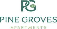 A logo with the text "Pine Groves Apartments" in front of it.