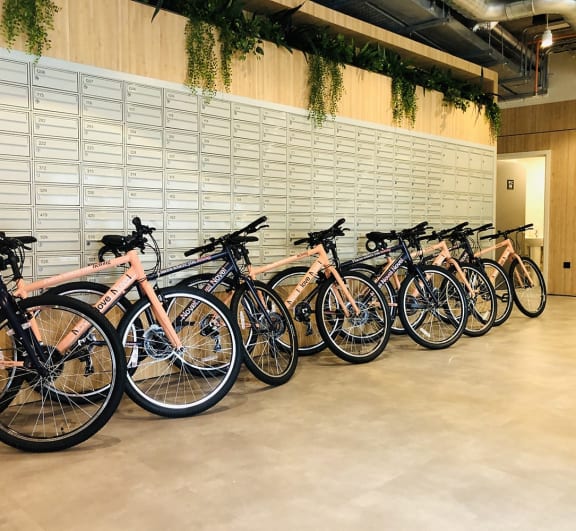 a row of bikes parked in a room