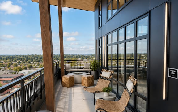 A balcony with a view of the cityscape.