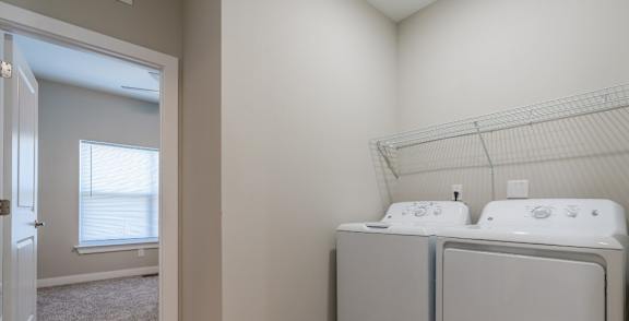 A laundry room with a washer and dryer.