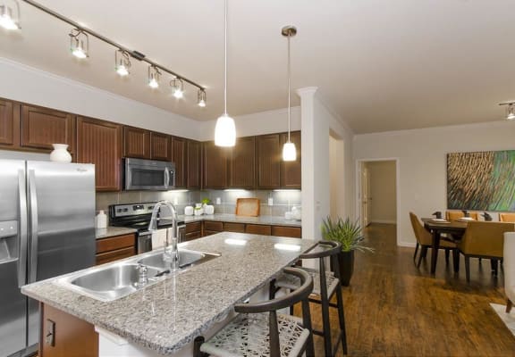 Kitchen gallery with table top at Park at Magnolia Apartments in Houston, TX