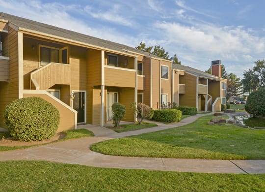 Exterior Patios or Balconies Overlooking the Lush Grass