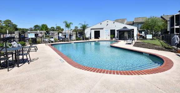 Large Outdoor Shimmering Pool at Normandy Woods in Riviera East, Houston, TX, 77015