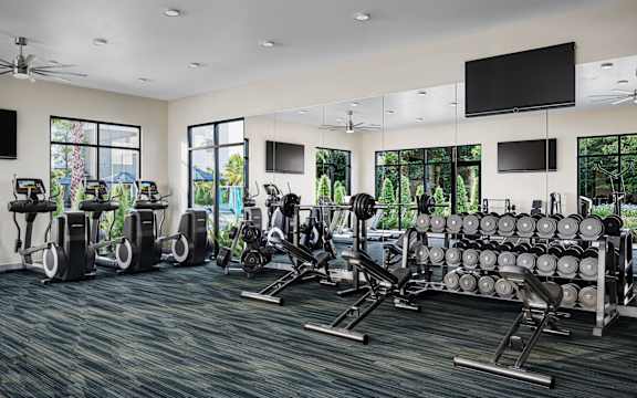 the gym at the residences at green valley one