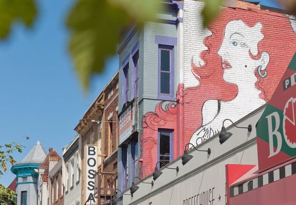 a mural of a woman on the side of a building at The Argonne Apartments, Washington, DC, 20009