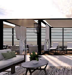 A modern outdoor seating area with white furniture and black railings.