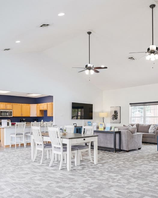 the view from the kitchen into the living room and dining room