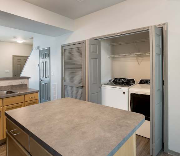 Kitchen island with laundry area